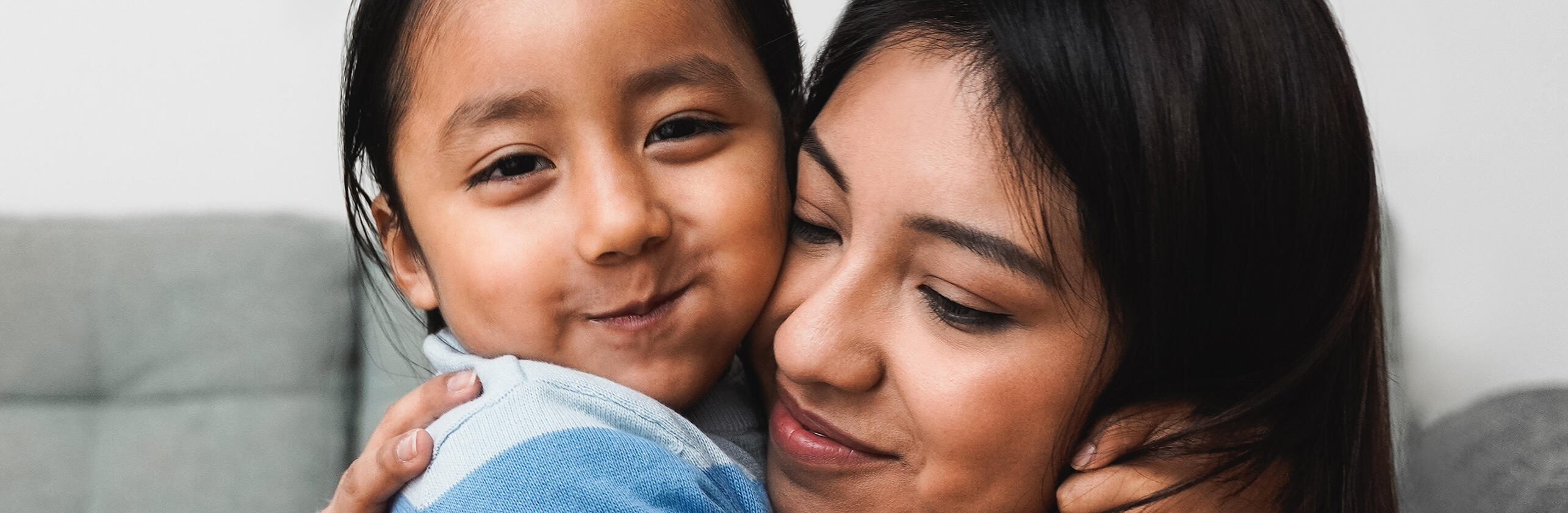 Mother and daughter hugging